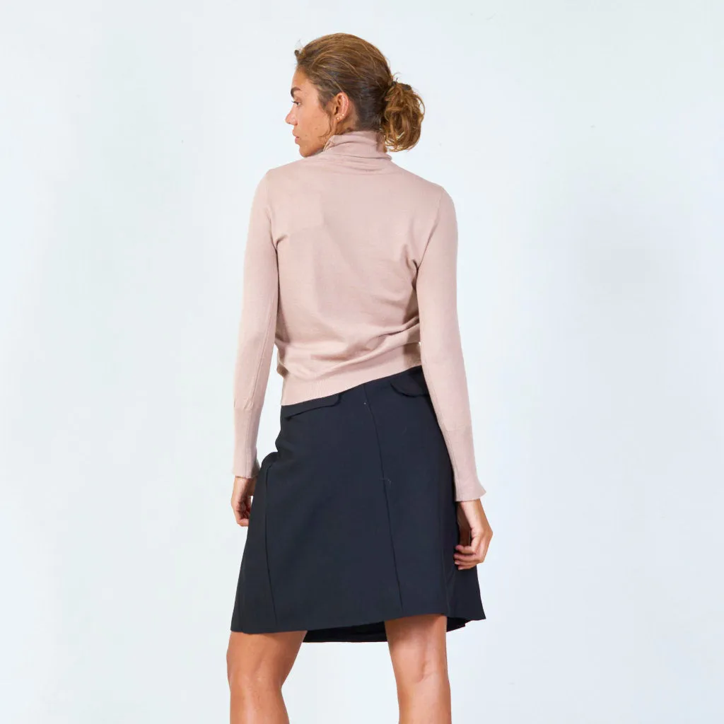 Classic turtleneck sweater with button details