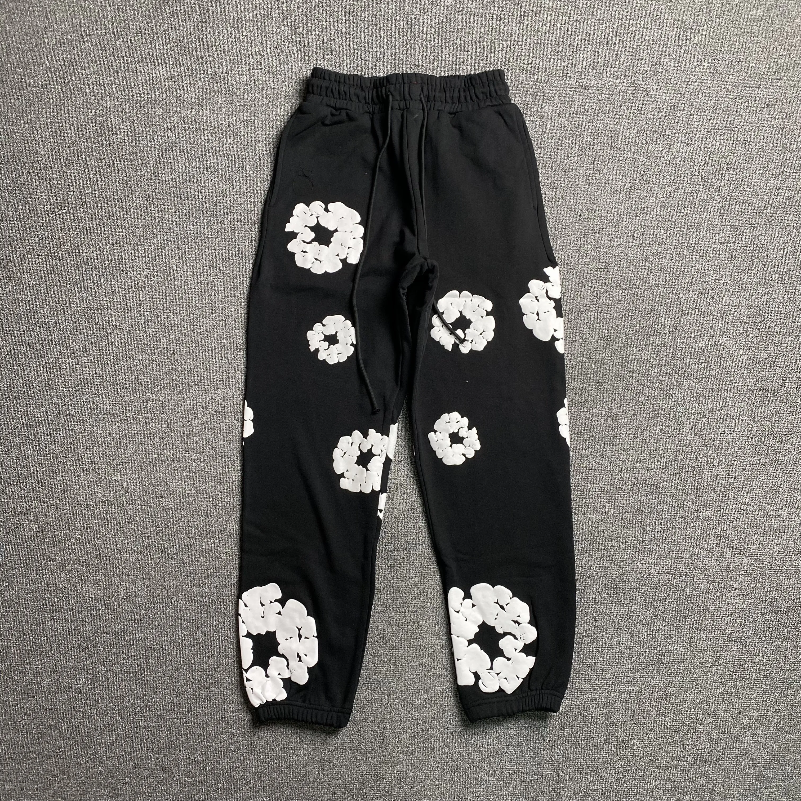 DENIM TEARS COTTON WREATH SWEATPANTS BLACK