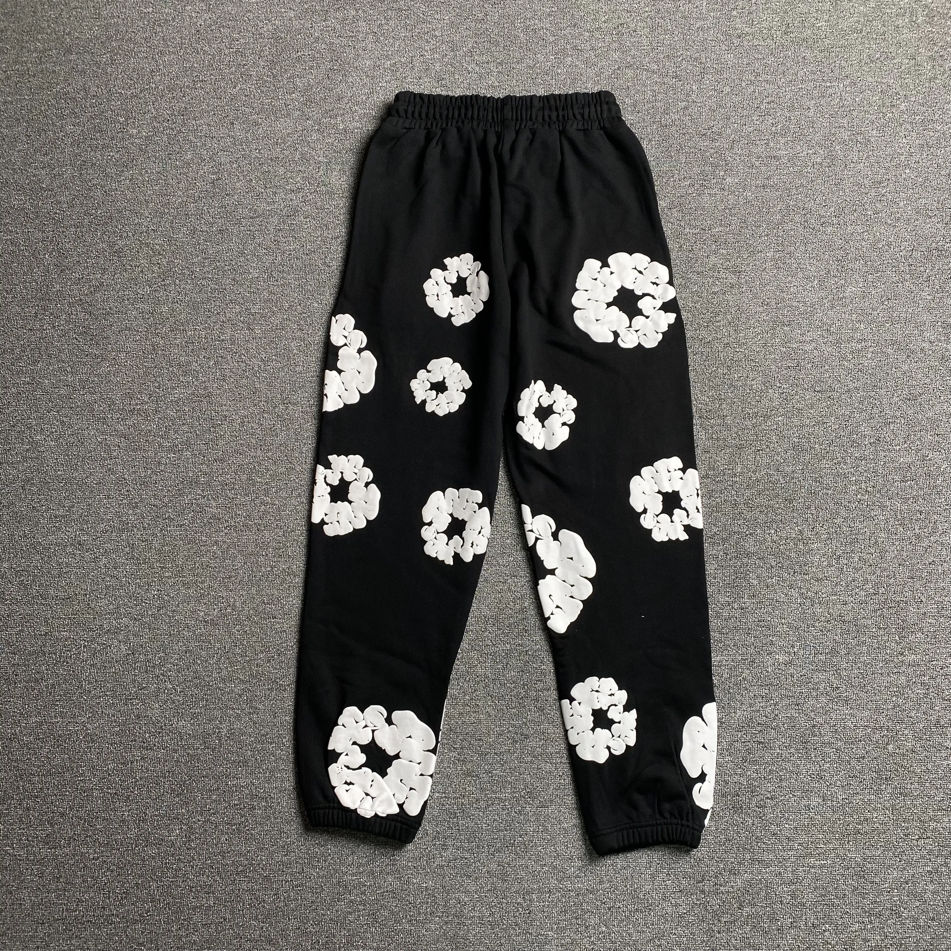 DENIM TEARS COTTON WREATH SWEATPANTS BLACK