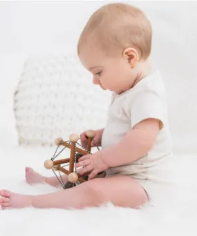 Organic Short-Sleeved Body Suit in Cream